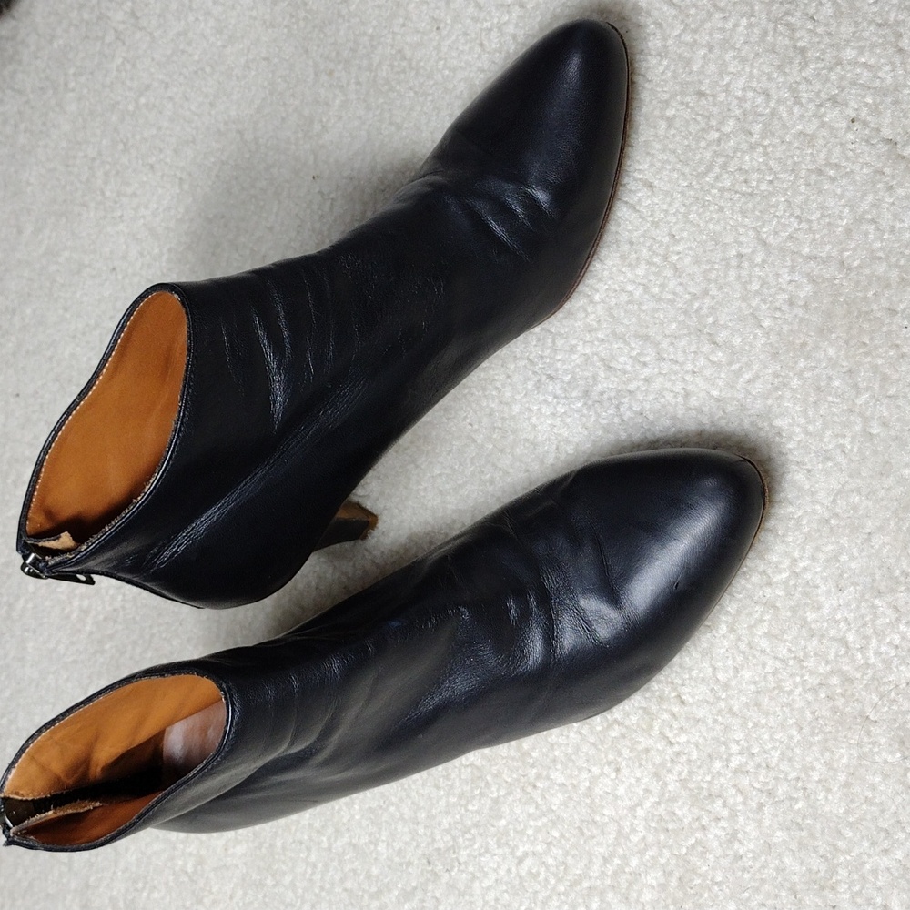 Woman by Common Projects women's black leather ankle boots. Size 8.5